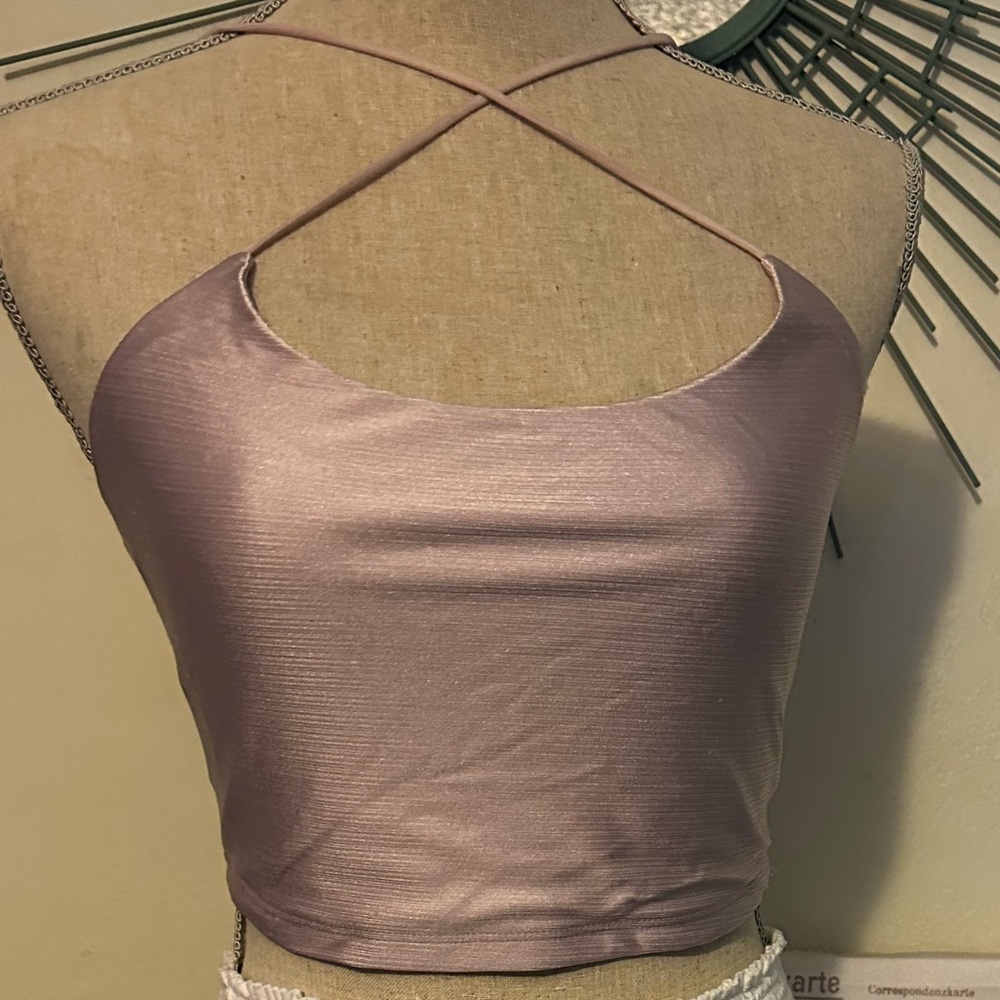 EUC Forever 21 M size top in a blush color tighten or loosen strings as needed.